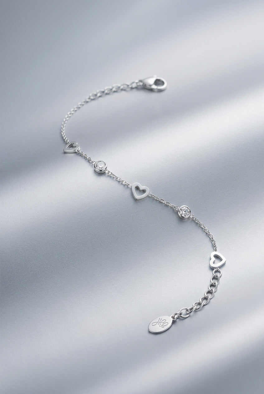 bracelet with heart and diamond charms